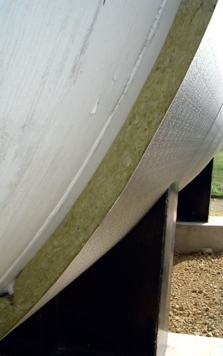 A section of wool matting visible on the side of a heat storage tank