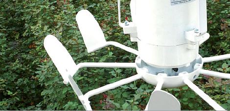 A Vertical air movement fan in a greenhouse